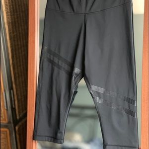 Reebok knee length Athletic leggings.